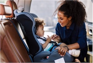 Kid in a Car Seat with his mom
